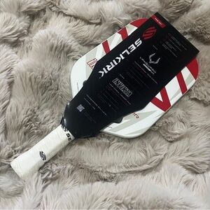 Selkirk Pickleball Paddle with Red and White Design